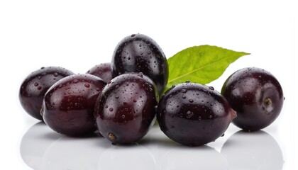 Several dark purple Jambolan plums covered in water droplets, with vibrant green leaf. Fresh fruit isolated on clean white background, perfect for summer Ramadan themes, offering healthy, natural