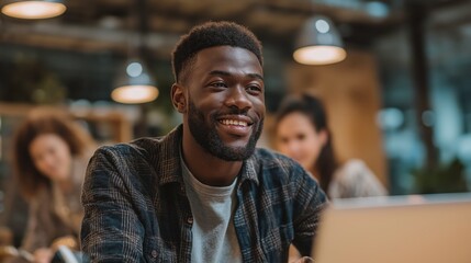 Smiling Man Working in Modern Office Environment