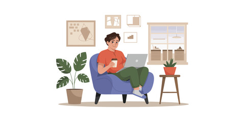 Man sitting in blue armchair holding coffee and using laptop in cozy home office with plants and framed pictures—symbolizing comfort and productivity