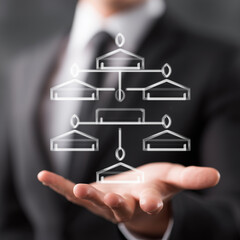 Fototapeta premium Man Holding an Organizational Chart Diagram