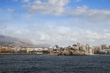 Obraz premium Aerial view from de Mediterranean Sea of the antique center of Benidorm city and the Levante Beach with the skyline.