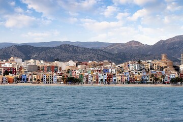 Fototapeta premium Aerial view of the colored houses in Villajoyosa town beach in the Mediterranean Sea, Alicante, Spain.