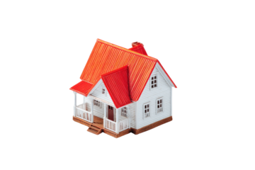 Miniature house model, with a red corrugated roof and white walls, sits centered on a black background.?Porch and small windows are visible