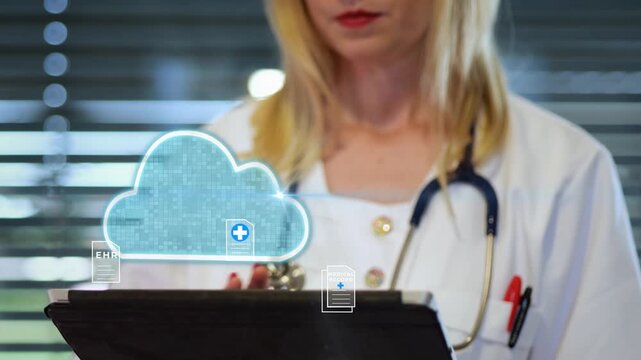 Female doctor uploads digital medical records to cloud storage using tablet. EHR, EMR and cloud healthcare concept