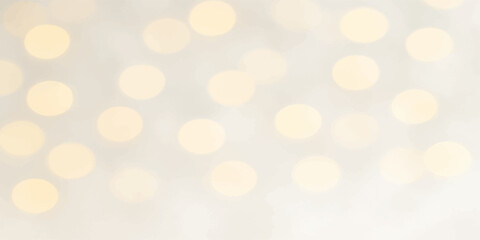 Golden, glittering, and bright, this abstract background shines with defocused bokeh lights, perfect for Christmas and holiday celebrations