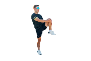 Man practicing leg stretches in athletic wear for fitness improvement