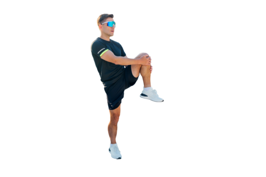 Man practicing leg stretches in athletic wear for fitness improvement