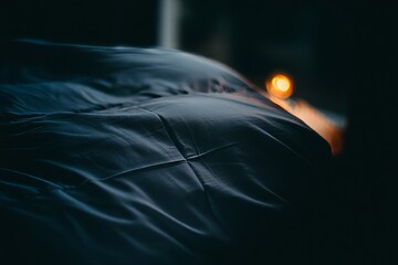 Abstract dark blue fabric texture background with soft light and shadow effects art