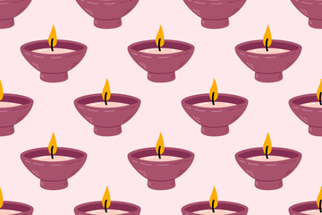 Pattern with burgundy bowl-shaped candles and glowing flame on soft background