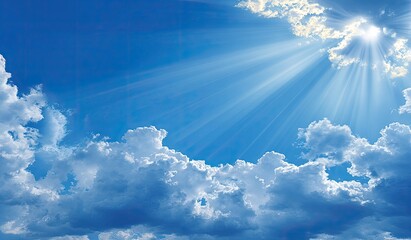 Radiant sunbeams piercing a partly cloudy sky