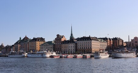 Stockholm's Glam Stam (old City) harbour at sunset with moored ships