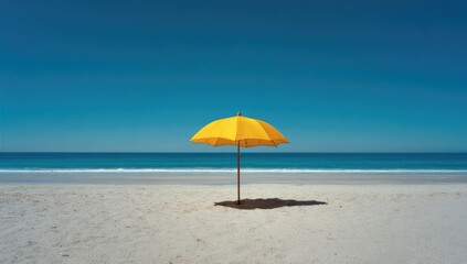Sunny beach scene with yellow umbrella (2)