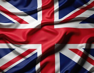 Fototapeta premium Realistic close-up of United Kingdom flag waving. Highly detailed fabric texture in blue, white, red shows national symbol of Great Britain fluttering in wind. Perfect for patriotic themes country