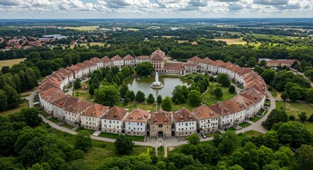 an aerial view of a castle surrounded by trees