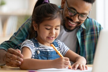 Dad Helping Daughter Draw at Home - Family Bonding