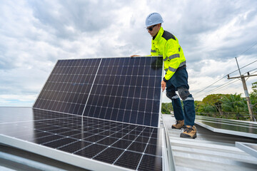 A skilled technician adjusts a solar panel on rooftop, emphasizing the transition to sustainable energy. Equipped with safety gear, the worker demonstrates precision in renewable energy installations.