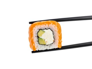 Delicious california roll sushi held by black chopsticks against a dark background isolated on transparent background