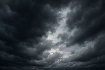 Dramatic dark clouds with a bright beam of light breaking through