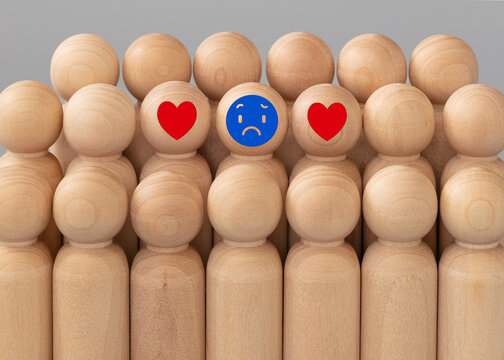 Heard broken concept. Blue figure
simulate a human depression and sadness, loneliness with a couple and love around. Horizontal format. 