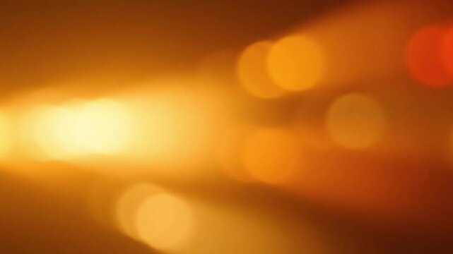 Soft light leaks moving smoothly across frame, warm and cinematic, loop-ready for overlays or romantic footage