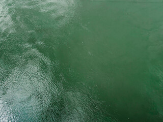 Water surface, photographed from above. River top view.