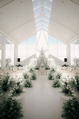 wedding altar decoration with a white rose theme looks luxurious
