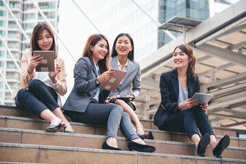 Businesswomen Partner use digital tablet online meeting team Partnership businesswoman talking...