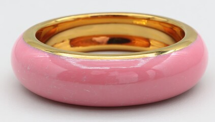 Gold-toned bangle,  pink enamel