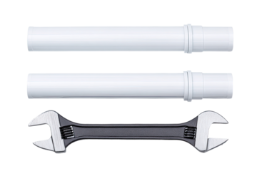 Two white plastic pipes and a dark adjustable wrench