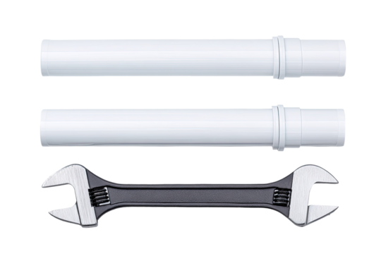 Two white plastic pipes and a dark adjustable wrench