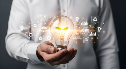 Hand holding lightbulb with a plant growing inside. Tech icons float behind. Concept image