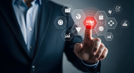 Businessman pushing "scam alert" button; technology, fraud prevention background. Used for cyber security