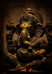 Fototapeta premium A closeup of a ganesha statue, a hindu deity, symbolizing wisdom, prosperity, and auspicious beginnings