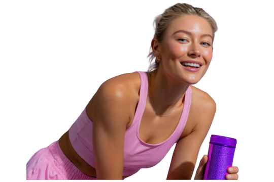 Radiant blonde woman in pink activewear smiling holding a glittery purple water bottle.