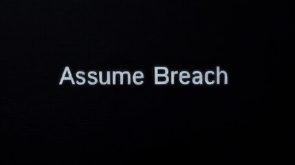 Zero Trust Concepts. Assume Breach text on a dark background, suggesting security themes or cyber threats.