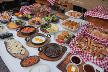 Turkish Breakfast spread featuring various dishes and fresh fruits