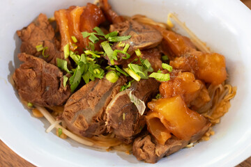 A delicious plate of tender meat garnished with fresh herbs, ready to be enjoyed. Perfect for culinary enthusiasts and food lovers.