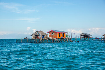 Overwater Wooden Huts In Sabah Southeast Asia Tropical Resort Scenery
