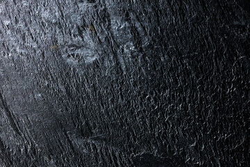Abstract background of uneven, textured wall.