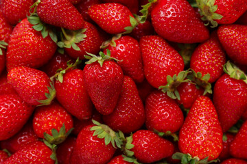 Texture of sweet fresh strawberries as background, closeup