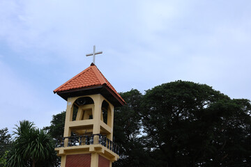Christian cross installed on the roof, background as a clear day