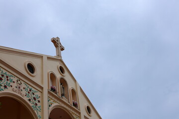 Christian cross installed on the roof, background as a clear day