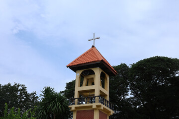 Christian cross installed on the roof, background as a clear day