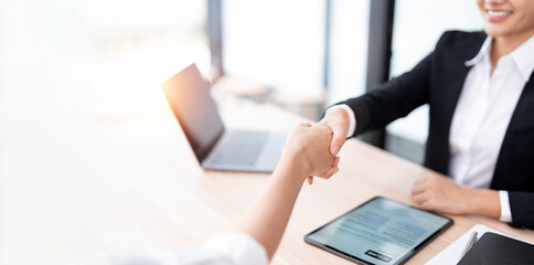 Businesswoman handshake and business people. Successful business concept.