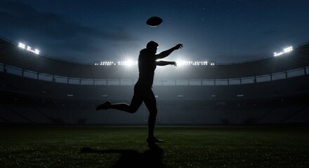 Silhouette of American Football Player Throwing Ball at Night Stadium