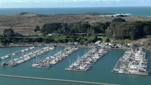 Aerial view of boats docked at , Bodega Bay, California, USA. The harbor provides a safe haven for fishing and recreational vessels.