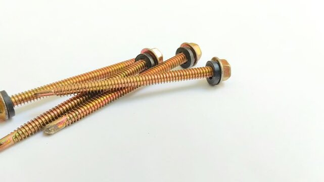 SDS (Self Drilling Screw) roofing bolts or light steel screws on a white background. Used to fasten and connect building components, especially on light steel roof and wall frames.