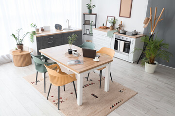 Table and counters in interior of light dining room