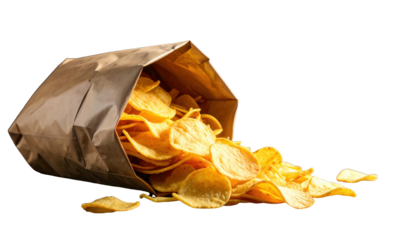 A bag of potato chips spilling out onto a surface with a dark background