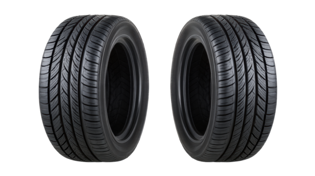 Two isolated car tires on transparent background showing detailed tread pattern